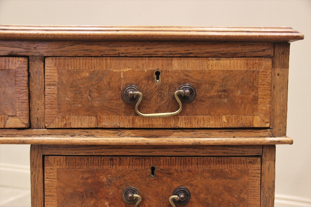 A late Victorian oak and pollard oak twin pedestal partners desk, the rectangular moulded top - Image 2 of 2