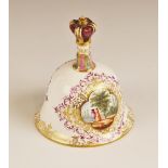 A Meissen porcelain bell, enamelled to each side with quatrefoil panels depicting courting