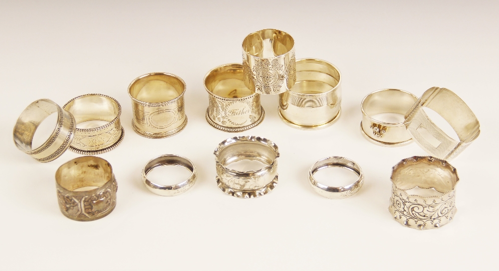 A selection of Victorian and later silver and silver coloured napkin rings, to include an