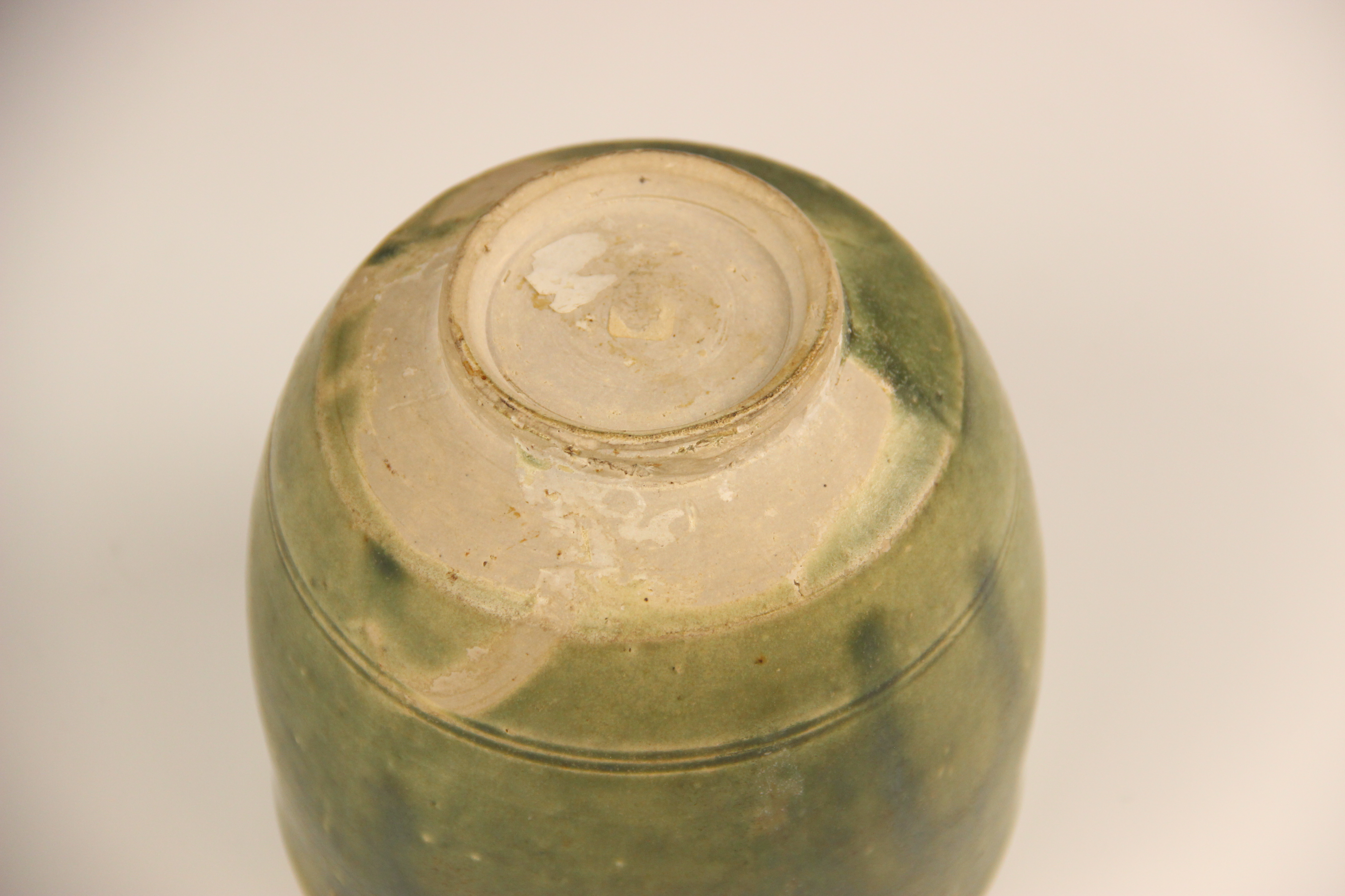 An Anamese pottery vessel, possibly 15th century, the cylindrical vase celadon glazed to the - Image 8 of 9