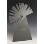 A Welsh slate decorative "fan" sculpture, 20th century, modelled with pierced and notched blades