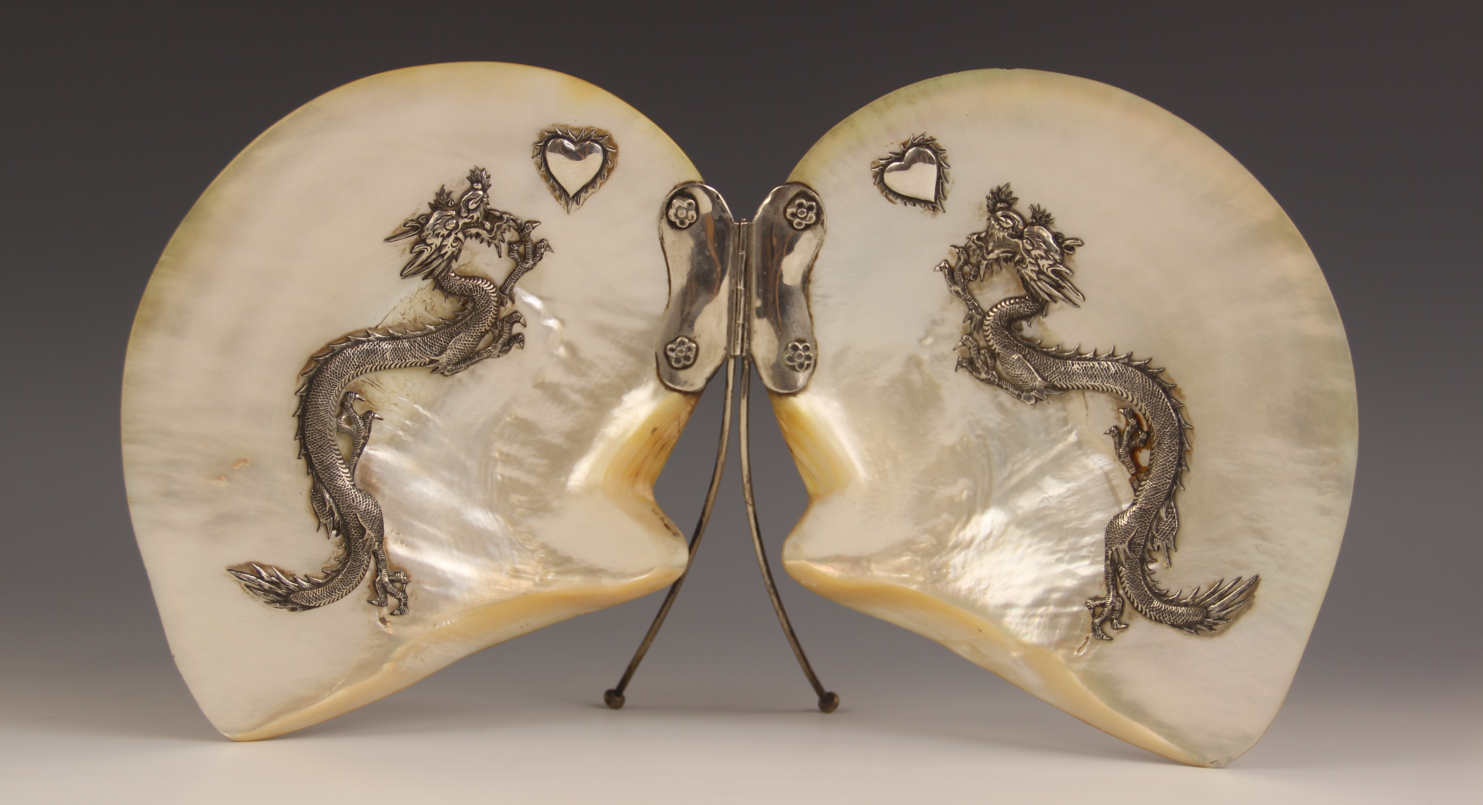 A Chinese silver mounted mother of pearl shell table screen, 19th century, designed as two hinged - Image 2 of 2