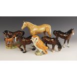 Four Beswick horse models, comprising: a Palomino Large Racehorse, model number 1564, printed