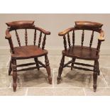 A Victorian style stained beech wood captains chair, 20th century, the horseshoe shaped top rail