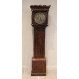 A George III oak cased thirty hour longcase clock, the 32cm diameter circular brass dial applied