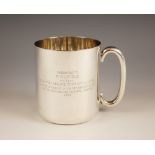A Victorian silver mug, Thornhill & Co, London 1885, of cylindrical form with C-scroll handle,