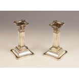 A pair of Victorian silver Corinthian column candlesticks, Martin, Hall & Co, Sheffield 1898, each