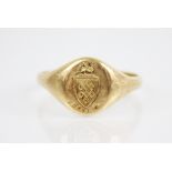 An early 20th century 18ct gold signet ring, the oval shaped head with a crest depicting a griffin