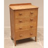 A honey oak chest of drawers by Waring & Gillow, early 20th century, the rectangular moulded top