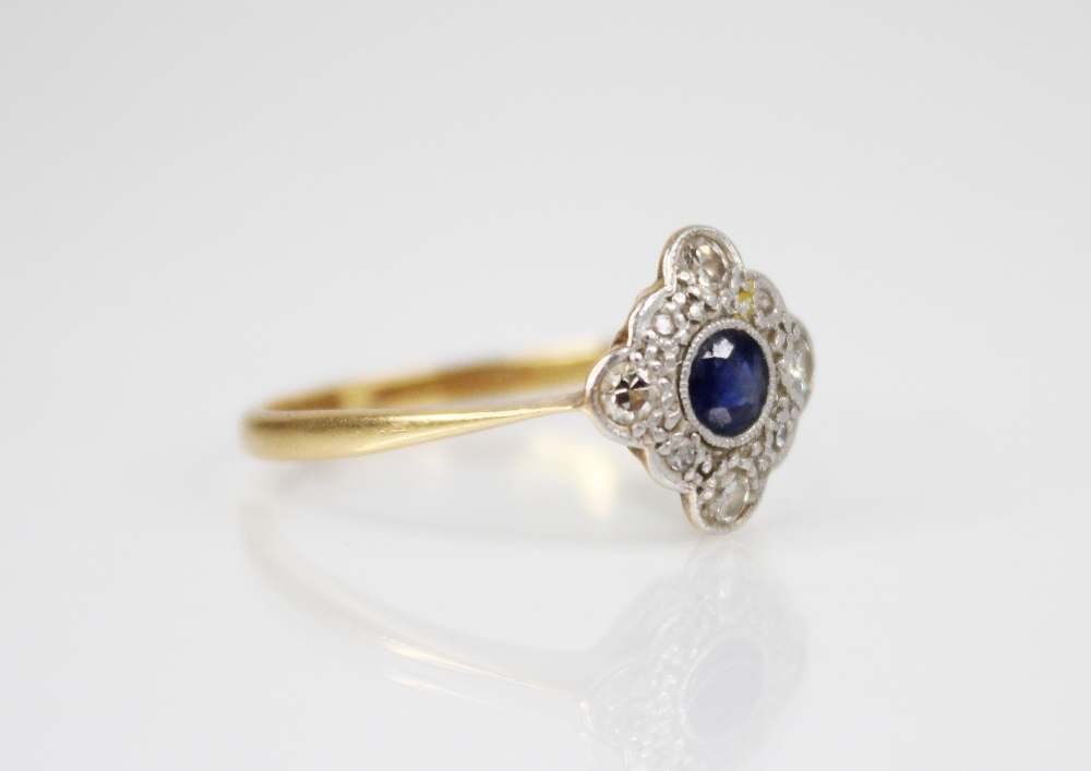 An early 20th century sapphire and diamond transitional ring, the central round mixed cut sapphire - Image 3 of 3