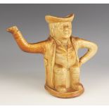 A salt-glazed stoneware figural teapot, 19th century, modelled as a seated Toby, probably by S. & H.