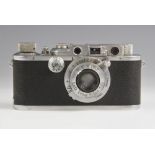 An early Ernst Leitz Wetzlar Leica III Rangefinder camera in chrome finish, serial number 116886,
