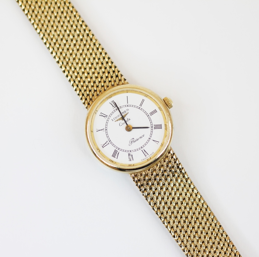 A ladies Longines 9ct gold ladies wristwatch, the circular white dial with Roman numerals and
