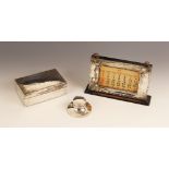 An Edwardian silver mounted cigarette box, Mappin & Webb, London 1906, of rectangular form with