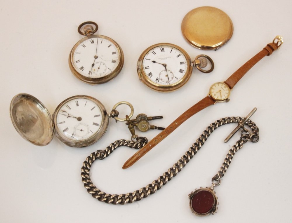 A ladies 9ct gold Garrard wristwatch, the circular cream dial with baton, arrowhead and Arabic