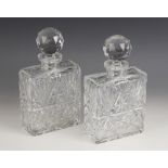A near pair of crystal decanters and stoppers in the manner of Thomas Webb, of rectangular form,