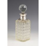 An Edwardian silver collared hobnail glass decanter, S Blanckensee & Son Ltd, Chester 1909, of