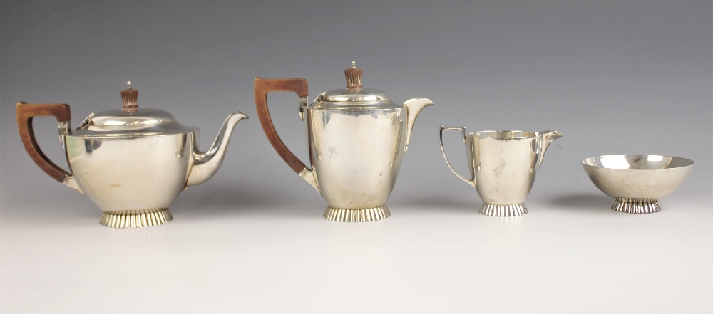 A George VI silver tea service, Wakely & Wheeler, London 1941, comprising a teapot, hot water jug, - Image 2 of 4