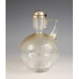 A Victorian silver mounted glass decanter, Horace Woodward and Co, Birmingham 1883, of spherical