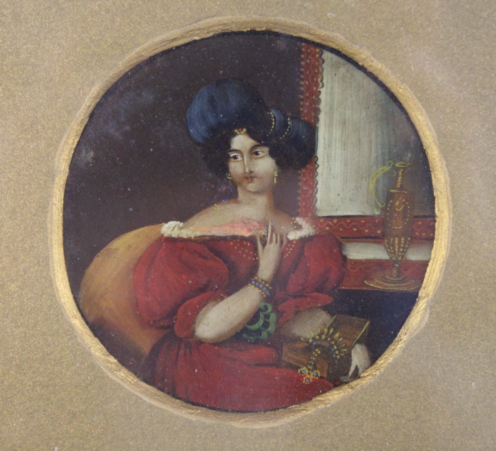 Continental school (19th century), A tondo portrait miniature depicting a lady in a blue hat holding - Image 3 of 3