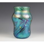 A John Ditchfield for Glasform studio glass vase of waisted form, the iridescent green glass