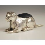 An Edwardian novelty silver cat pin cushion, Adie & Lovekin Ltd, Birmingham 1907, modelled lying