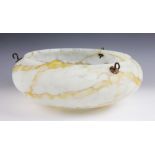 An Art Deco opaque and amber marbled glass plafonnier, early 20th century, of typical form with