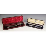 A Victorian cased set of silver Kings pattern melon carvers, 'JR' Sheffield 1853, each with weighted