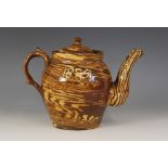 An unusual English Agateware teapot and cover, 19th century, double-spouted and titled in slip 'Mr &