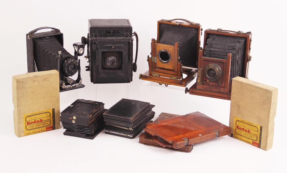 A Thornton Pickard mahogany and brass field camera, stamped "2947" with retailer's plaque for "