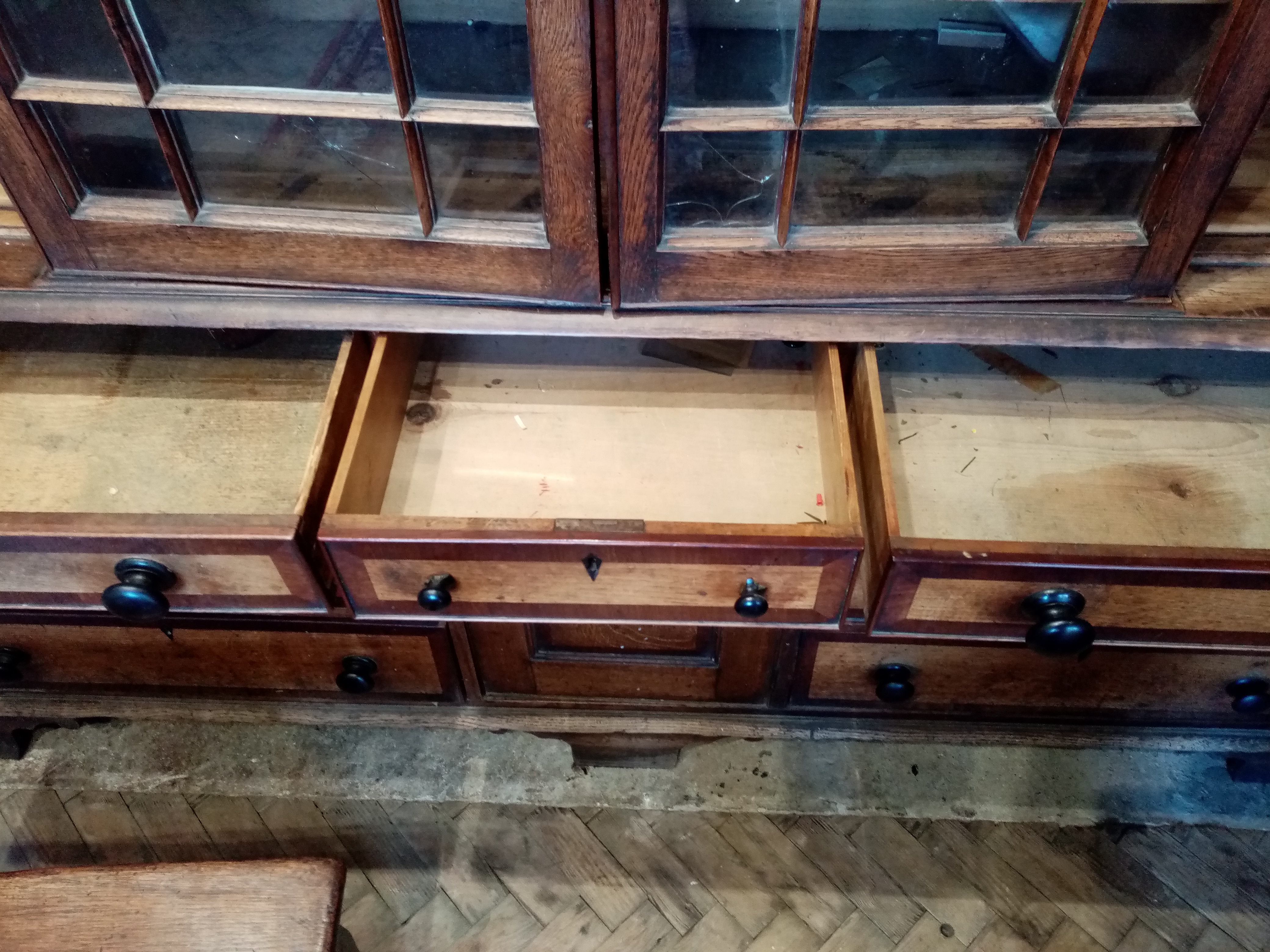 A George III oak and mahogany crossbanded breakfront housekeepers cupboard, the moulded cornice - Image 4 of 8