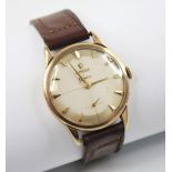 A gentleman's vintage 9ct gold Omega Geneve wristwatch, the two-toned circular dial with arrowhead