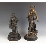 A spelter figure of a boy holding a monkey, French, late 19th century, upon socle base, 35cm high,