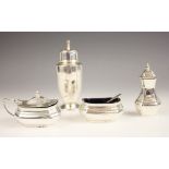A George V three-piece silver condiment set, Barker Brothers Ltd, Birmingham 1933-35, comprising