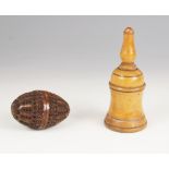 A carved coquilla nut box, 19th century, modelled as a two piece egg joined by a turned thread,