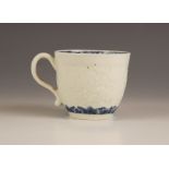 A Worcester porcelain unusual florally moulded coffee cup, circa 1765-1760, extensively moulded with