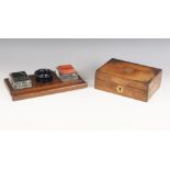 An Art Deco style oak desk stand, 20th century, with two rectangular glass inkwells, each with