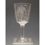 A glass goblet, early 20th century, engraved with a bulldog standing upon a Union flag and script "