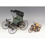 A boxed Franklin Mint 1/8 scale die-cast model of a 1893 Duryea motor carriage, finished in green,