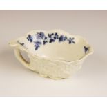 A Worcester porcelain geranium leaf butterboat, circa 1758-1765, relief moulded to the exterior, and