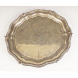 An Edwardian silver salver, Barker Brothers, Birmingham 1901, of shaped hexagonal form with beaded