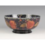 A Moorcroft footed bowl in the Pomegranate pattern, early 20th century, full William Moorcroft