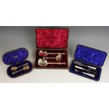 A cased pair of Victorian silver bouillon spoons, Lee & Wigfull, Sheffield 1895, with embossed
