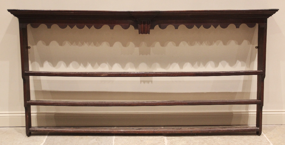 A George III oak dresser base, the rectangular moulded three plank top above three lip moulded - Image 4 of 15