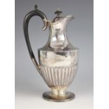 An Edwardian silver ewer, Cooper Brothers and Sons, Sheffield 1904, of shouldered baluster form with