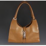 A Gucci 'Jackie' handbag, the tan pebbled leather bag, with silver tone hardware and double top