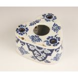 A Delft tin-glazed blue and white inkwell, 18th century, of heart form with central ink-well