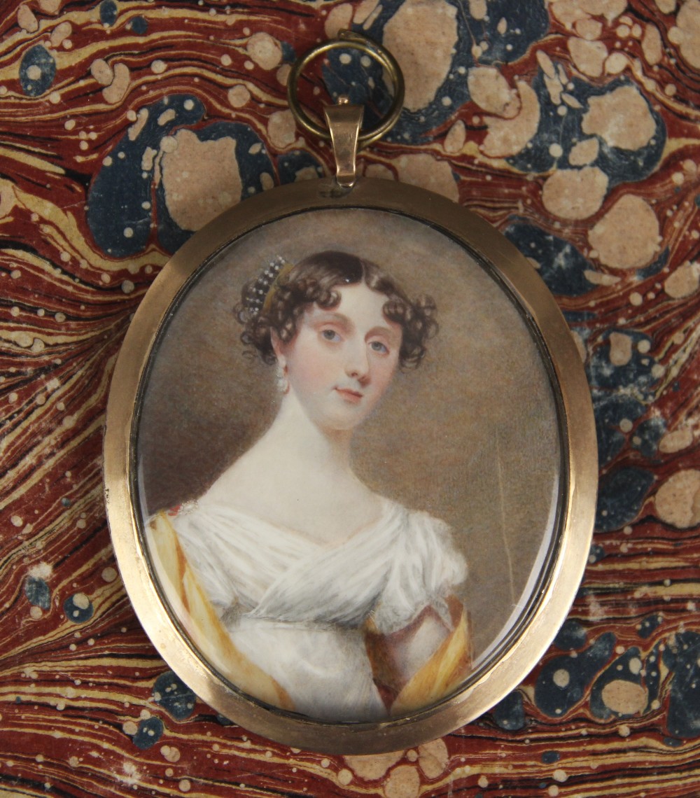 English school (late 18th/early 19th century), A half length portrait miniature depicting a young