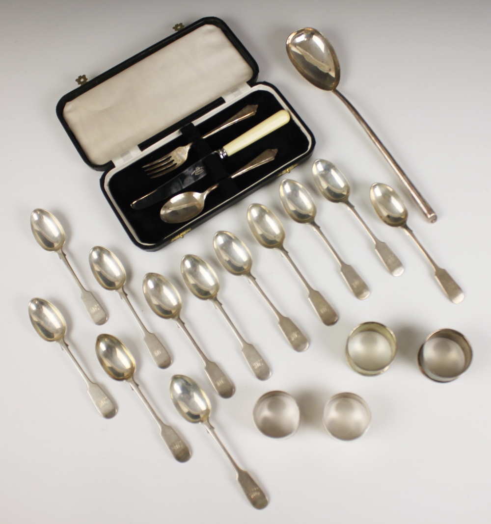 A set of twelve Victorian silver fiddle pattern teaspoons, Goldsmiths' Alliance Ltd, London 1889, of