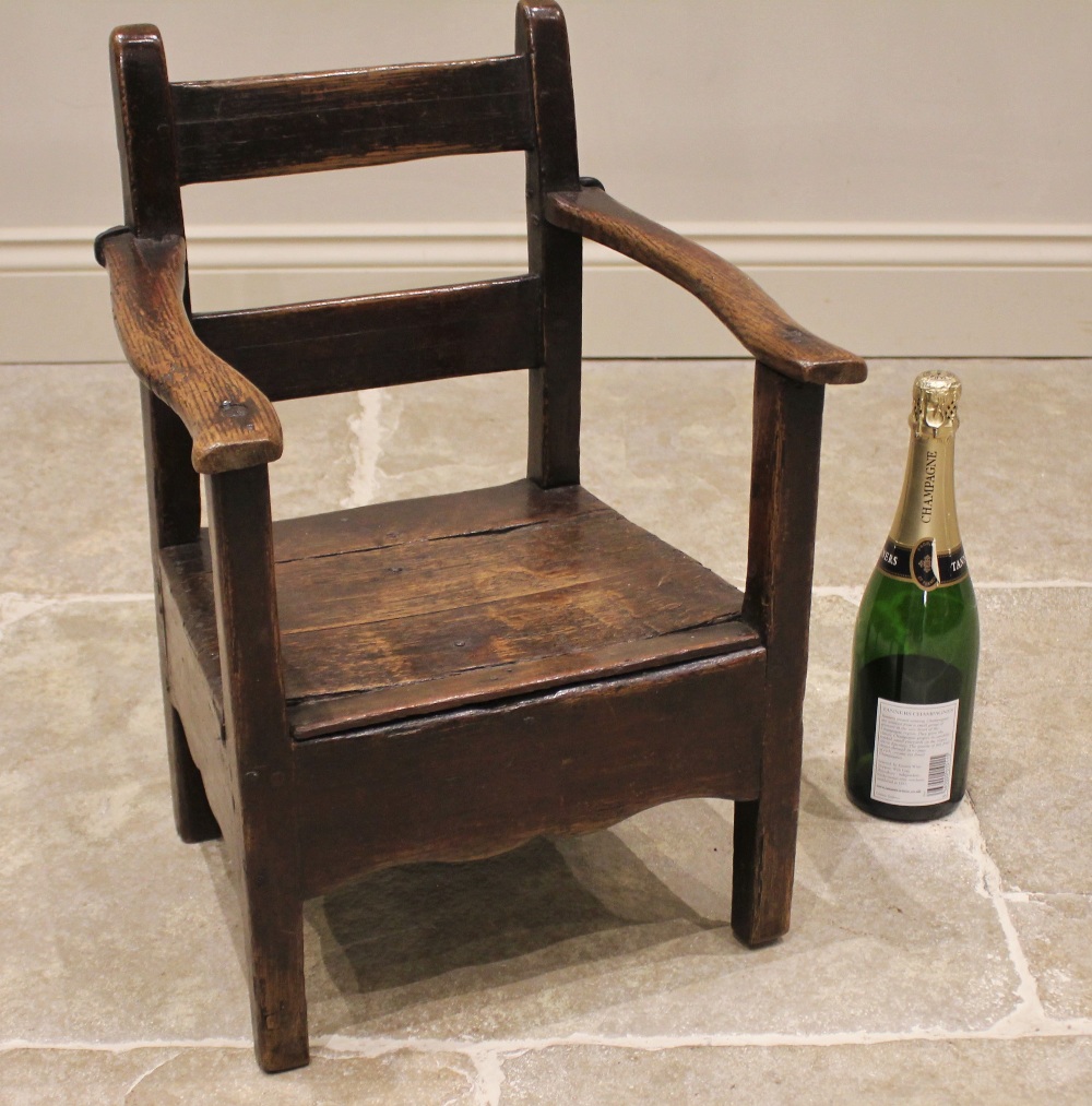 A Welsh oak child's primitive chair, late 18th/early 19th century, the rail back above open arms and - Image 2 of 3